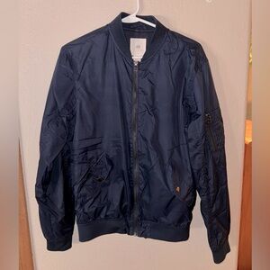 Navy blue windbreaker